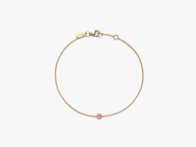 Solitaire Armband NOW mit pinkem Saphir aus 18k Gelbgold von GISELLE Zürich