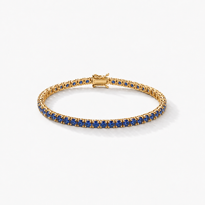 GISELLE Classic Tennis Armband mit blauen Saphiren in 18k Gelbgold – Gesamtansicht ohne schwarze Rhodinierung.